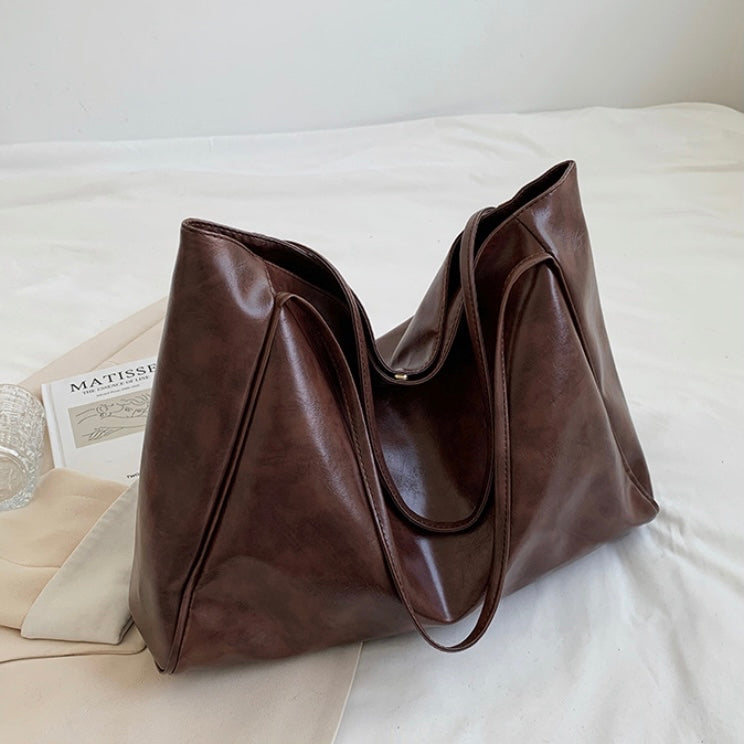 Paula | Glänzende Ledertasche