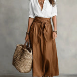Vera – Two-piece set: black top and olive green midi skirt